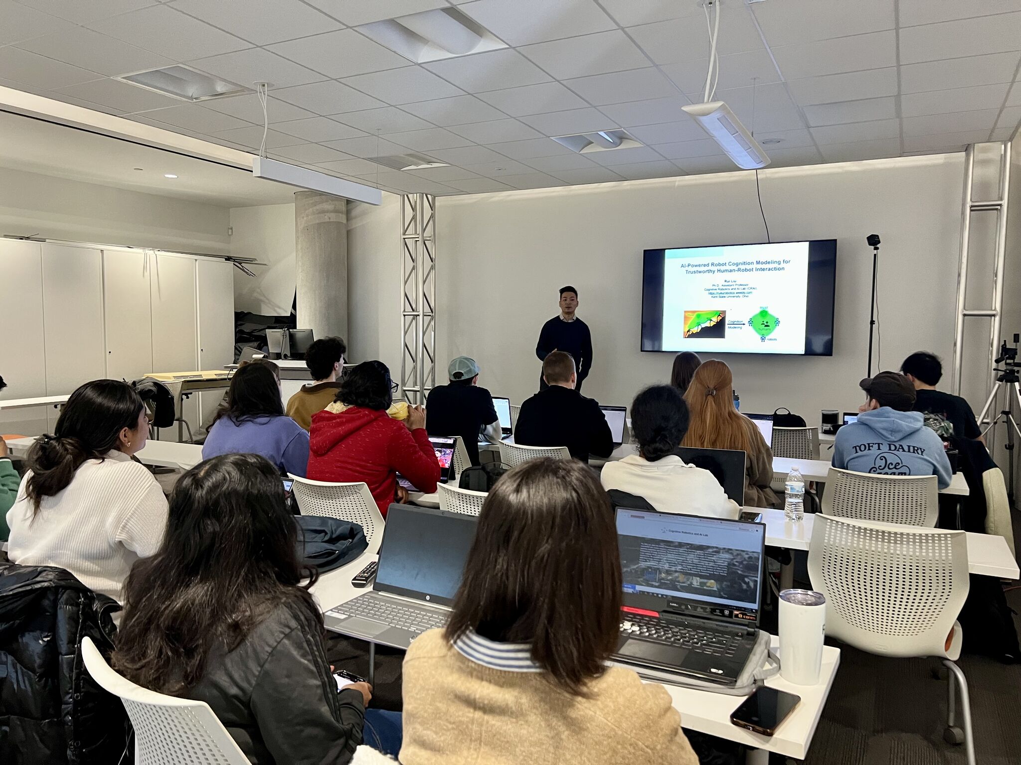 Prof. Rui Liu speaking to students during the guest lecture